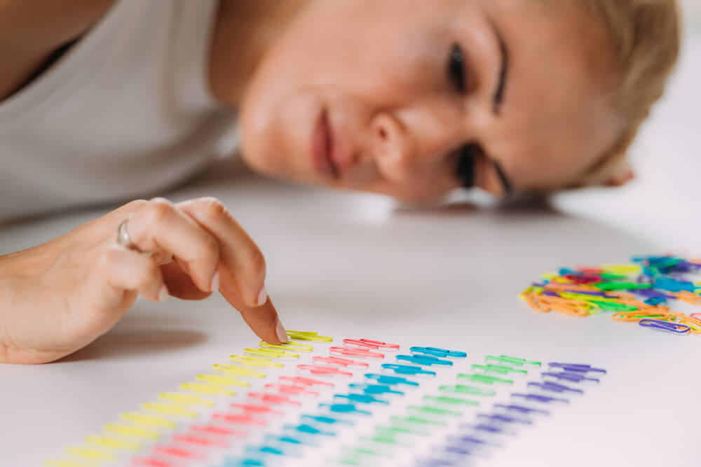 ranscranial magnetic stimulation (TMS) in treating OCD could help in reducing intrusive thoughts, repetitive checking, excessive cleaning, counting rituals, and mental compulsions.  